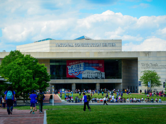 The exterior of the National Constitution Center under blue skies in Philadelphia