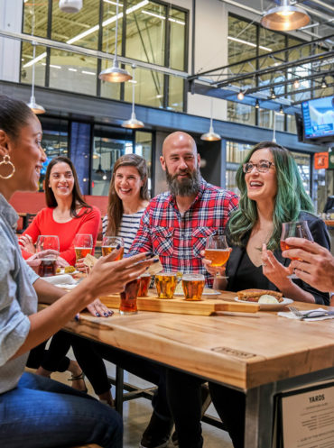 People hanging out at the Yards Brewery Company location in Philadelphia
