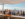 Guests at Bok Bar with a Philadelphia skyline view in the background.