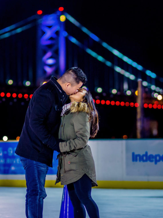 A couple kissing at Blue Cross RiverRink Winterfest