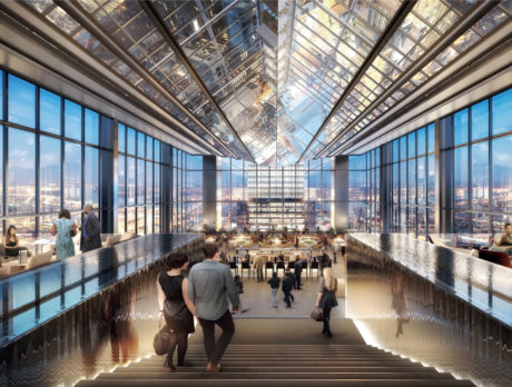 A rendering shows a couple walking down the stairs of the Four Seasons Hotel Philadelphia toward a bar with views of the city.