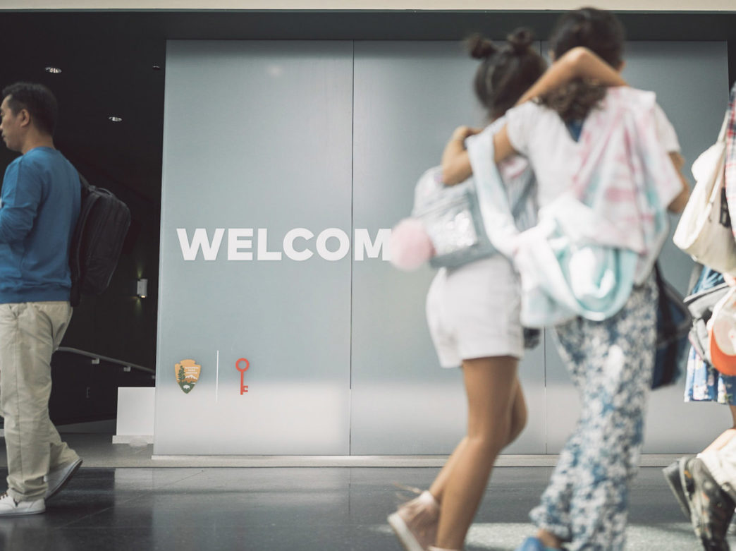 People walking into the Independence Visitor Center in Philadelphia
