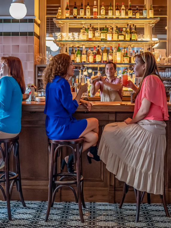 Guests sitting at the bar at The Love in Philadelphia