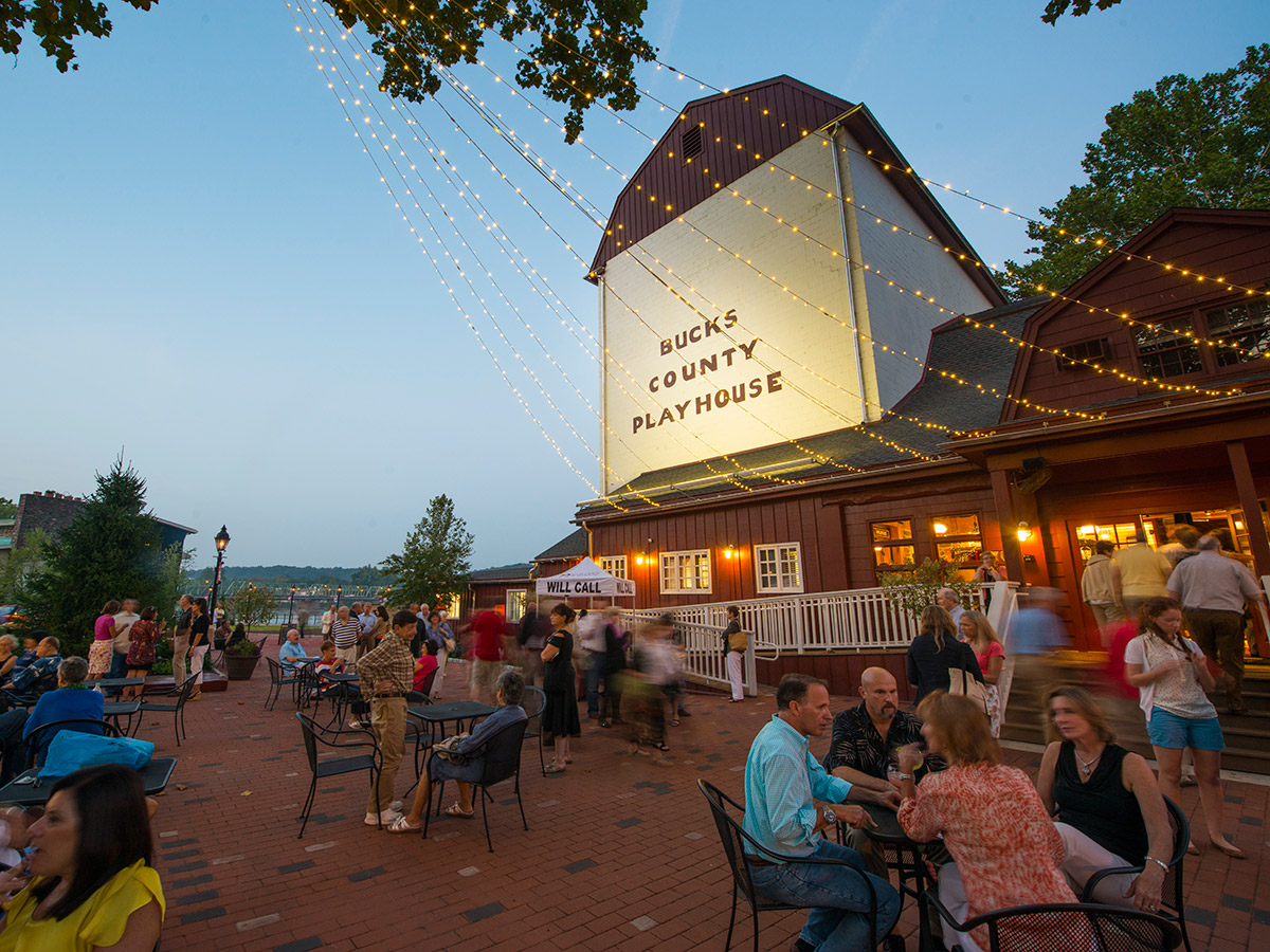 Patrons enjoy outside dining on the Delaware River waterfront at Bucks County Playhouse