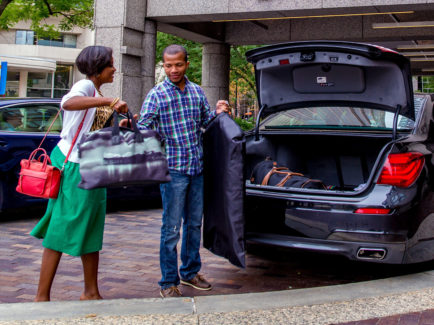 People unloading stuff from their car at The Logan in Philadelphia