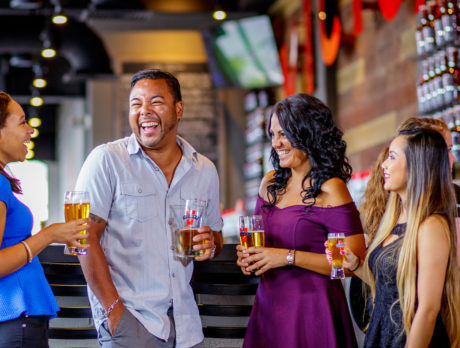 Group drinking beers at the Kennett Square location of Victory Brewing Company