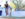 Woman mini-golfing and laughing at Blue Cross RiverRink
