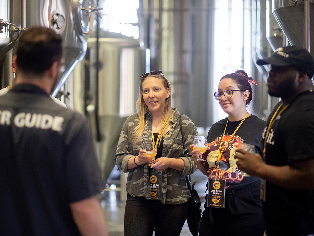 Visitors on a tour of a brewery in Philadelphia