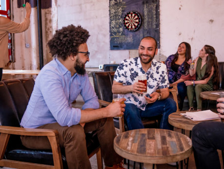 Friends drinking beer at Love City Brewing Company in Philadelphia