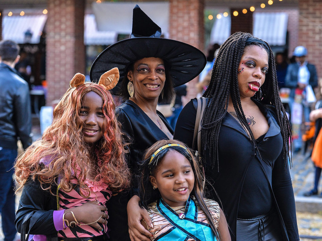 Women in Halloween costumes at South Street Fall PumpkinFest in Philadelphia
