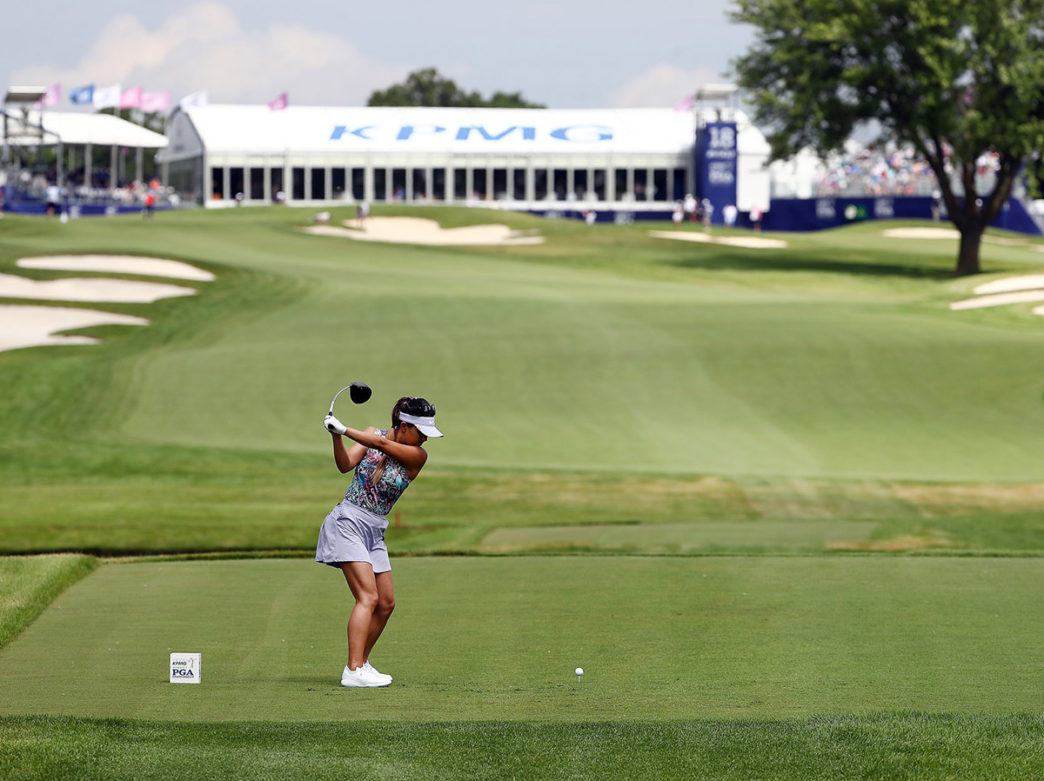 Golfer swinging at the KPMG Women's PGA Championship