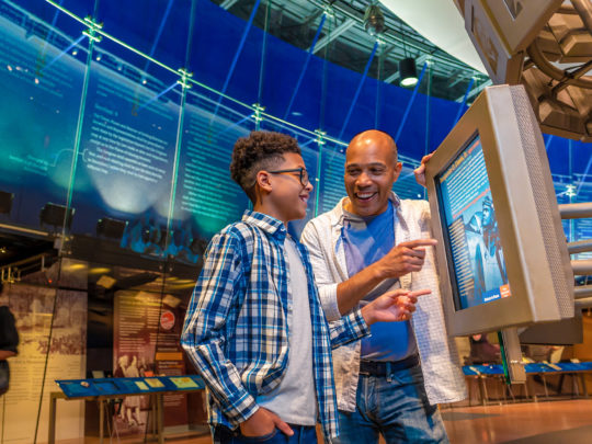 A father and son at the National Constitution Center in Philadelphia