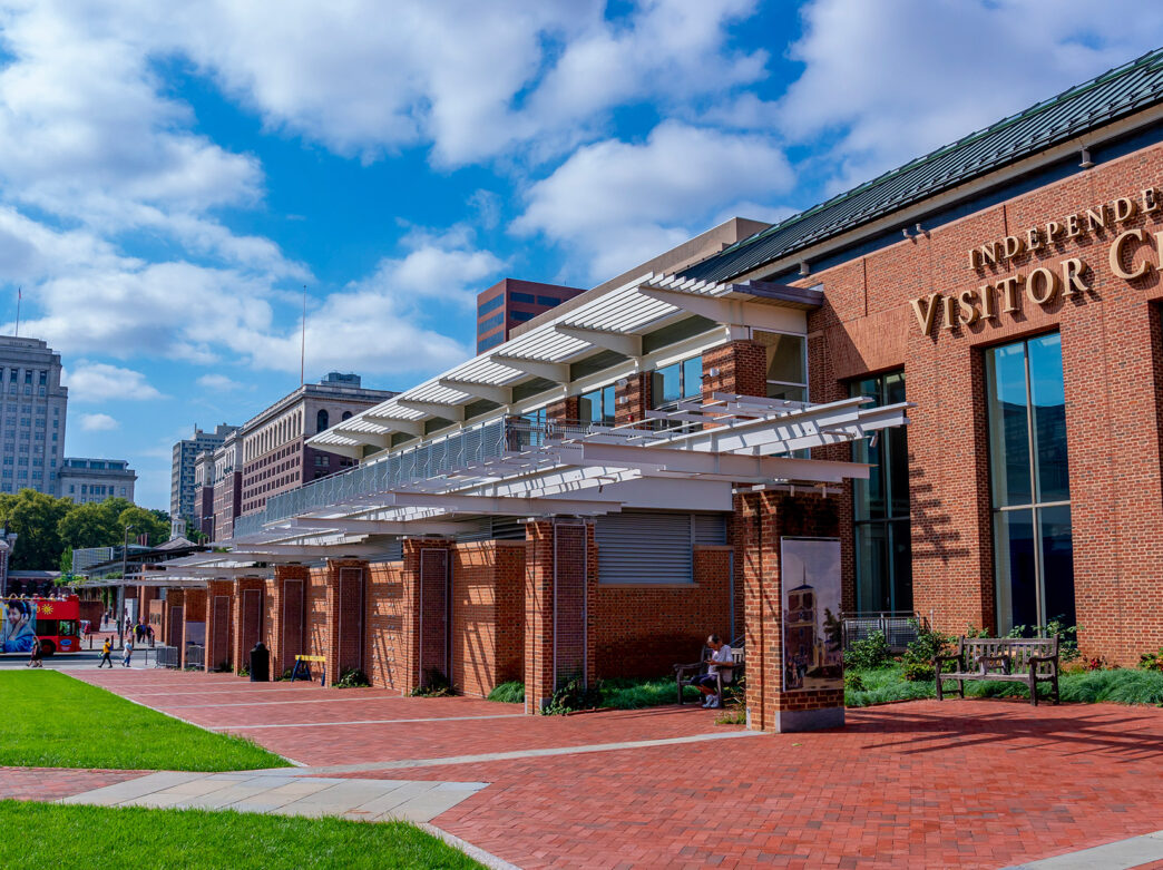 Exterior of the Independence Visitor Center in Philadelphia with Independence Hall in the background