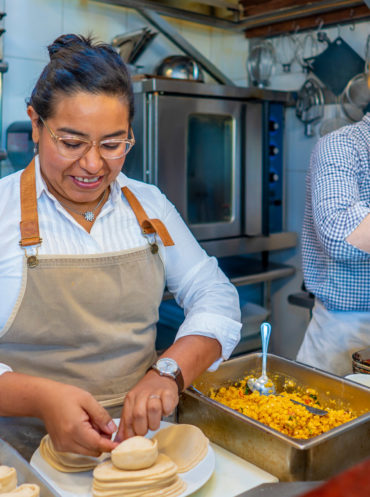 Chef Jezabel Careaga making food at the cafe she owns.