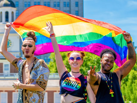 People with a Pride flag outside Independence Hall in Philadelphia