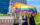 People with a Pride flag outside Independence Hall in Philadelphia