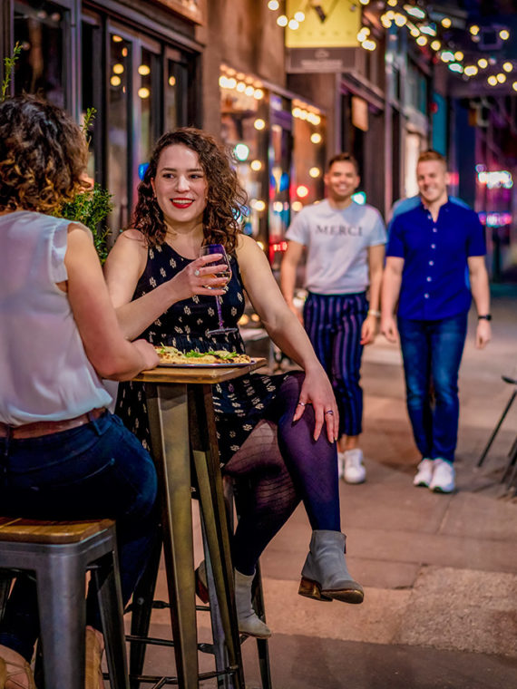A couple dining outside at Barbuzzo in Philadelphia