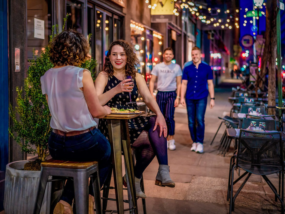 A couple dining outside at Barbuzzo in Philadelphia