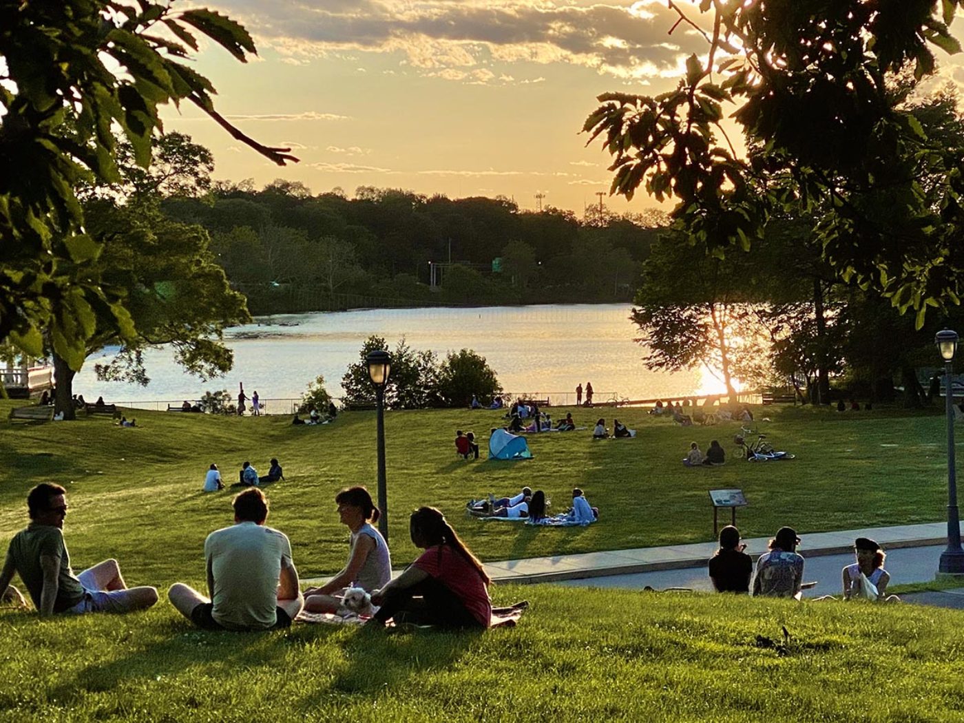 People outside at the Waterworks enjoying the weather.