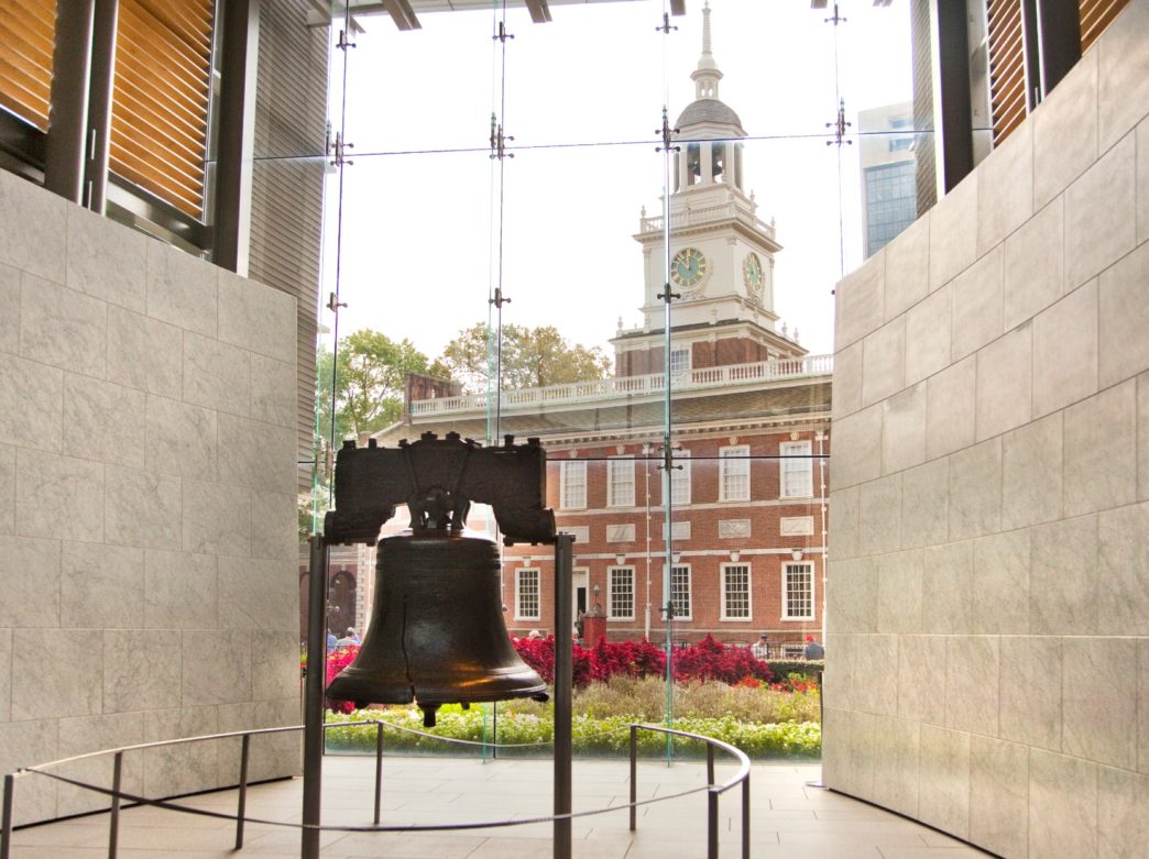The Liberty Bell with Independence Hall in the background