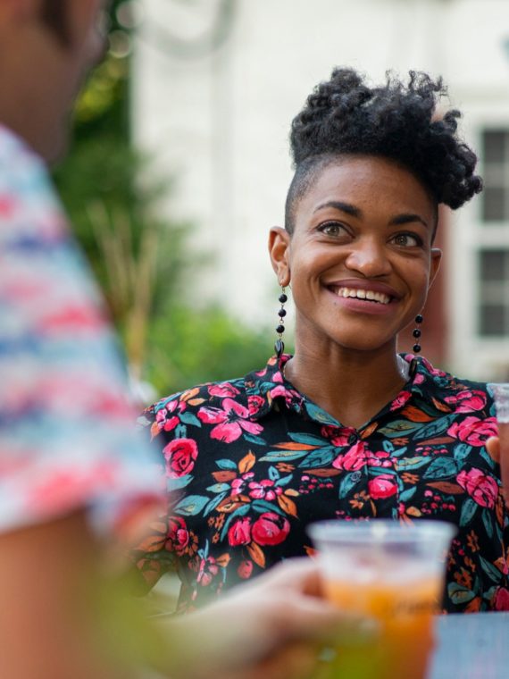 A woman has a drink at Peddler's Village in New Hope