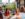 People dine outdoors outside of The Bourse Food Hall in Philadelphia