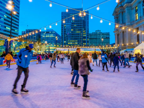 People ice skate at ROthman Ice Rink in Philadelphia