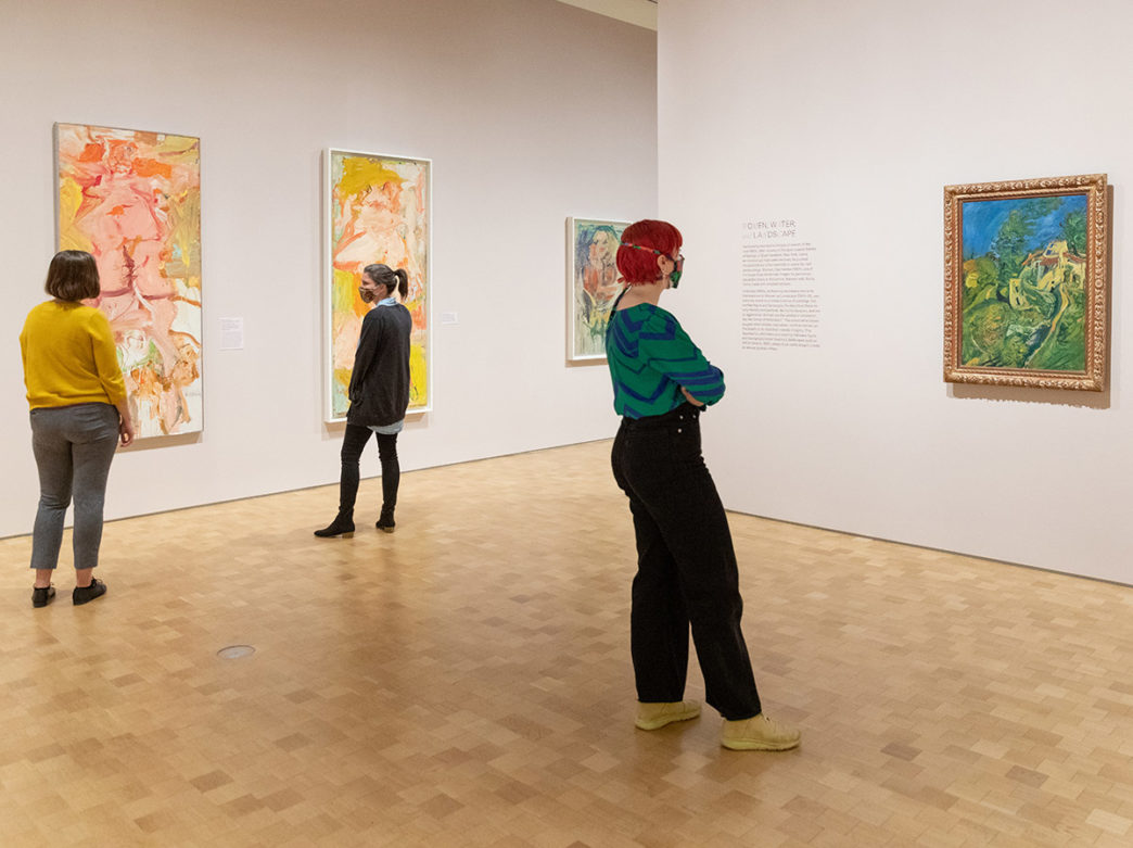 People wearing masks look at paintings at the Barnes Foundation in Philadelphia