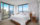 A bedroom with views of Philadelphia at the Element Philadelphia hotel