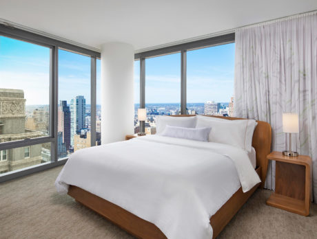 A bedroom with views of Philadelphia at the Element Philadelphia hotel