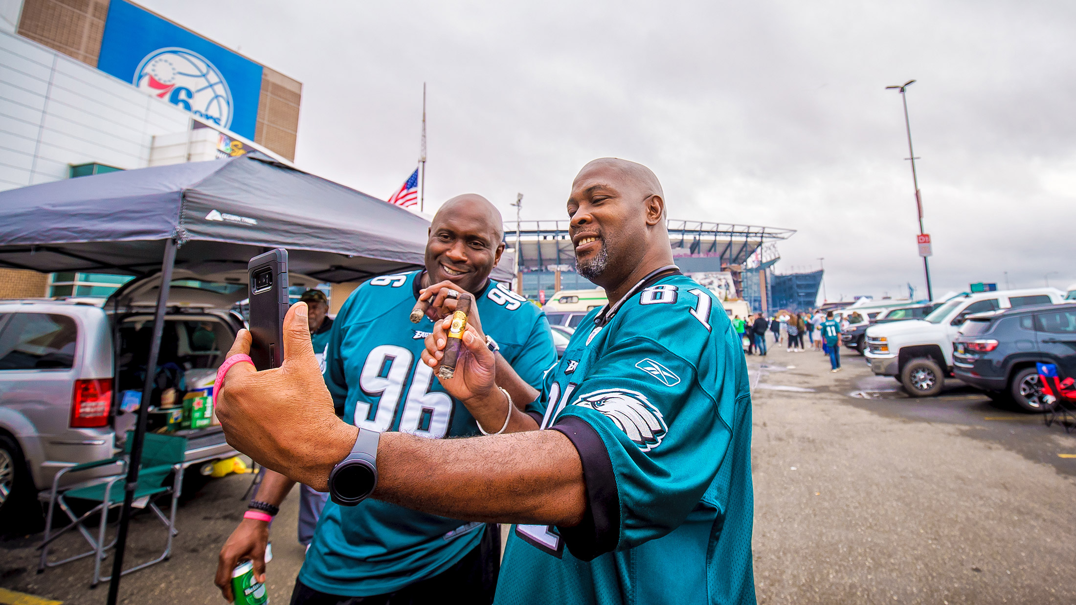 Two Philadelphia Eagles fans take a selfie while they tailgate outside of Lincoln Financial Field in South Philly