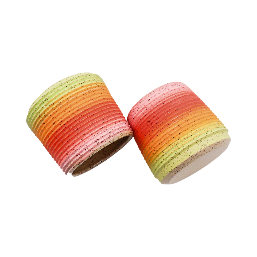 Two clay glasses that are yellow, orange and red