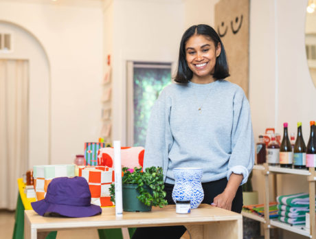Shannon Maldonado poses in front of some items in her shop, YOWIE