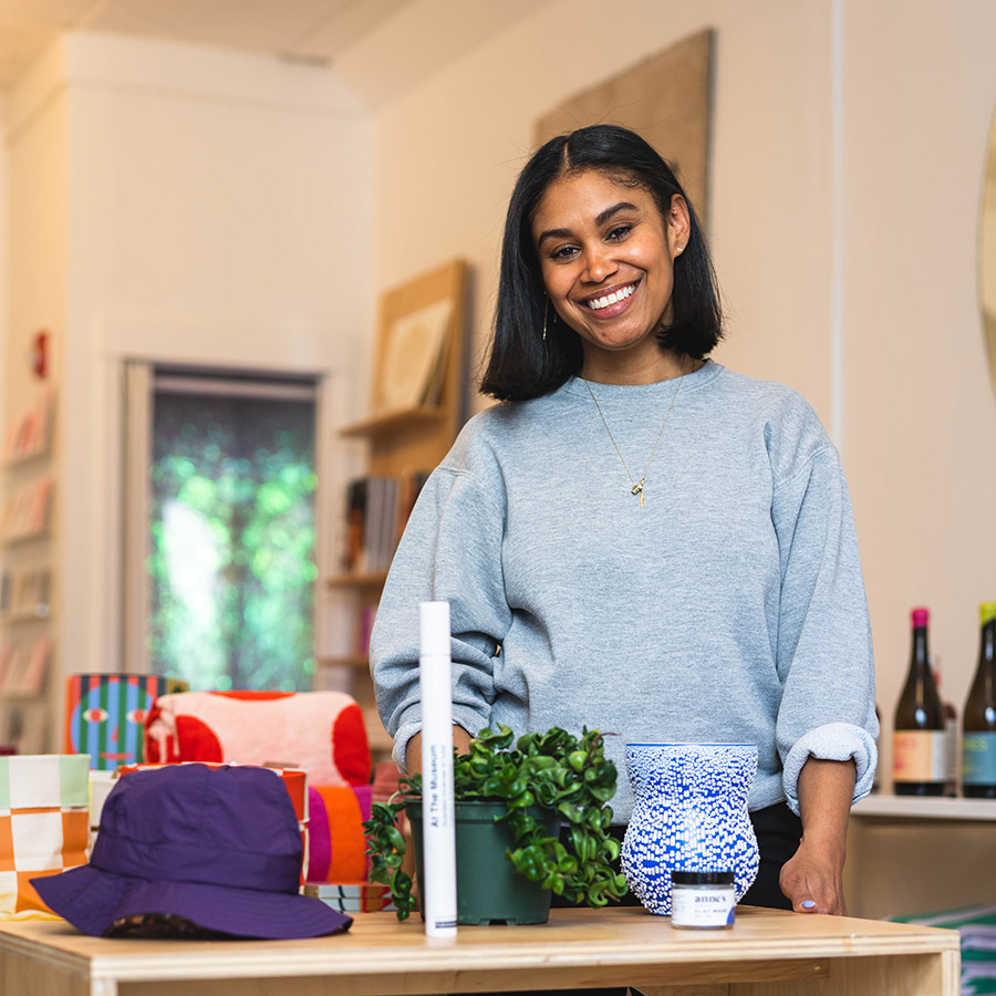 Shannon Maldonado poses in front of some items in her shop, YOWIE