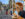A composite image: on the left, a person standing amidst mosaics at Philadelphia's Magic Gardens; on the right a person sitting at a table and holding a beer