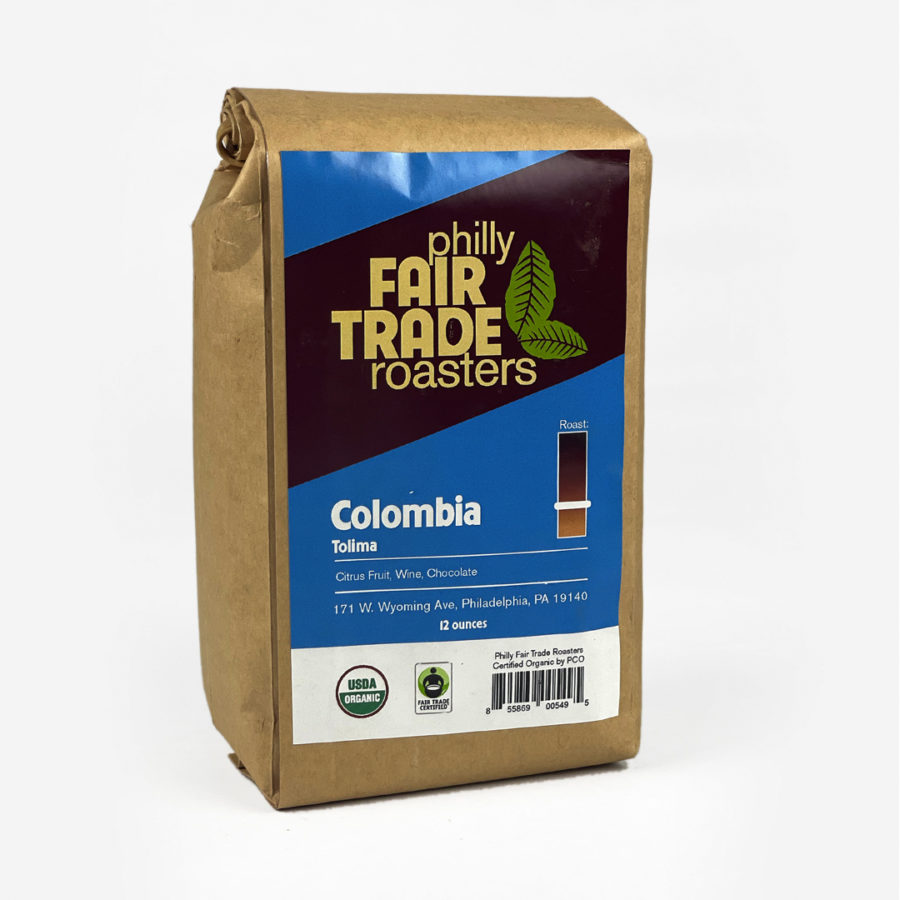 A bad of Colombia coffee beans from Philly Fair Trade Roasters. The bag is brown, and the sticker is black and blue and white.