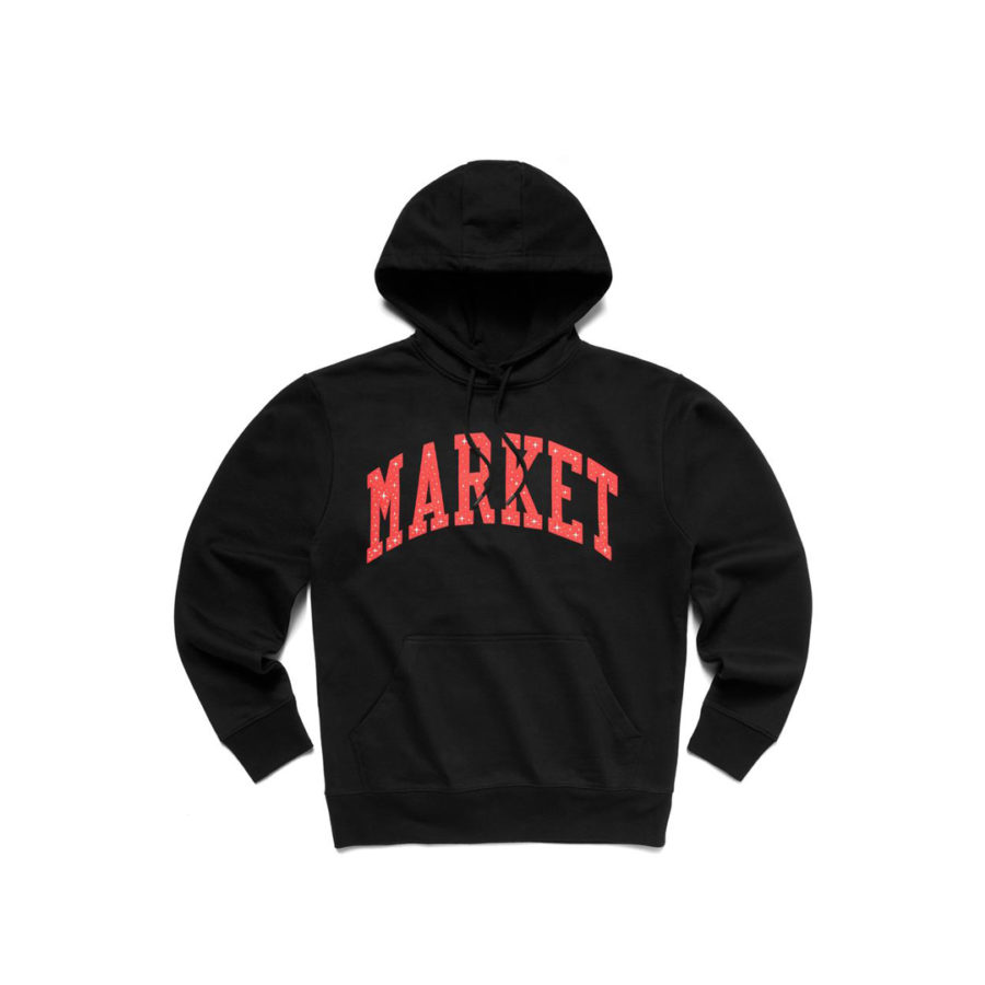 A black sweatshirt against a white backrgound. On the sweatshirt it says MARKET in orange capital letters.