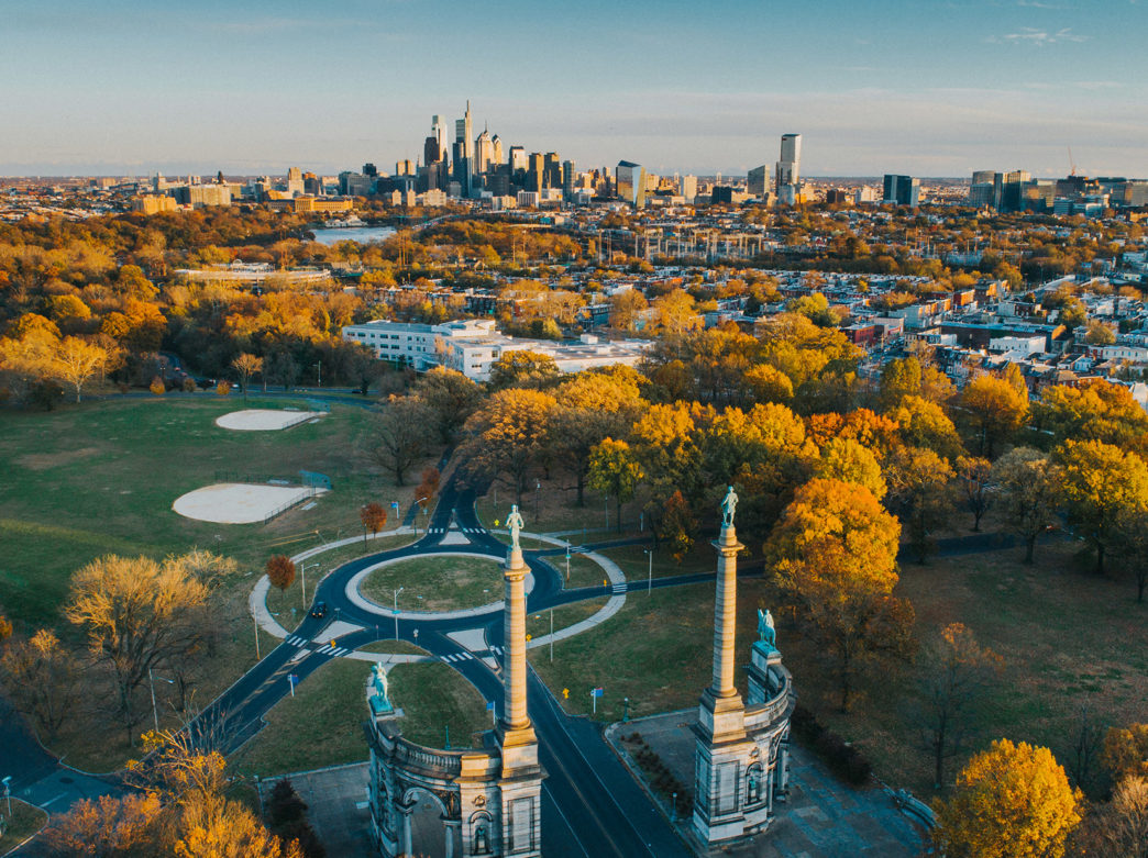 An aerial photo of Fairmount Park and the Philadelphia skyline