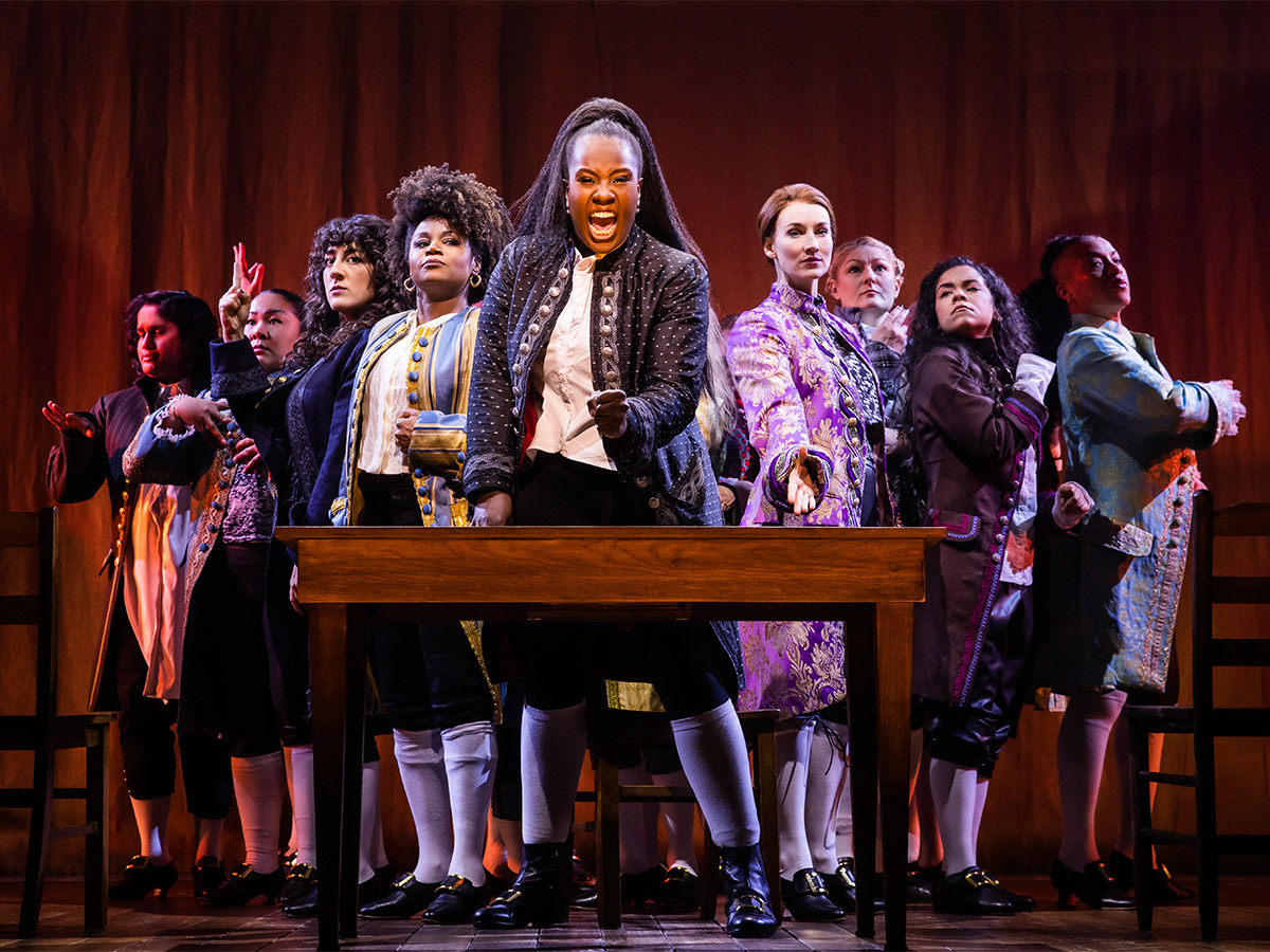 The cast of 1776 performing on stage