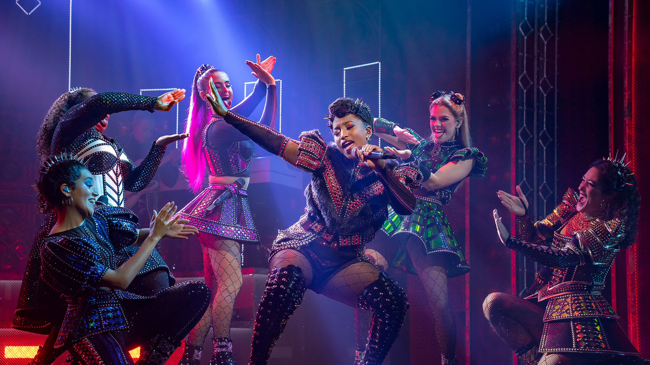 Performers with SIX singing and dancing