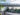 Man biking and couple walking along the Delaware River Trail
