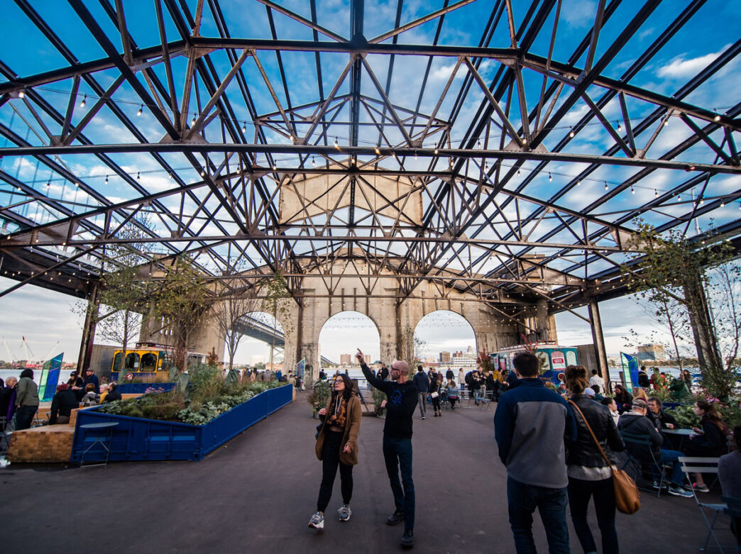 People walking through Cherry Street Pier