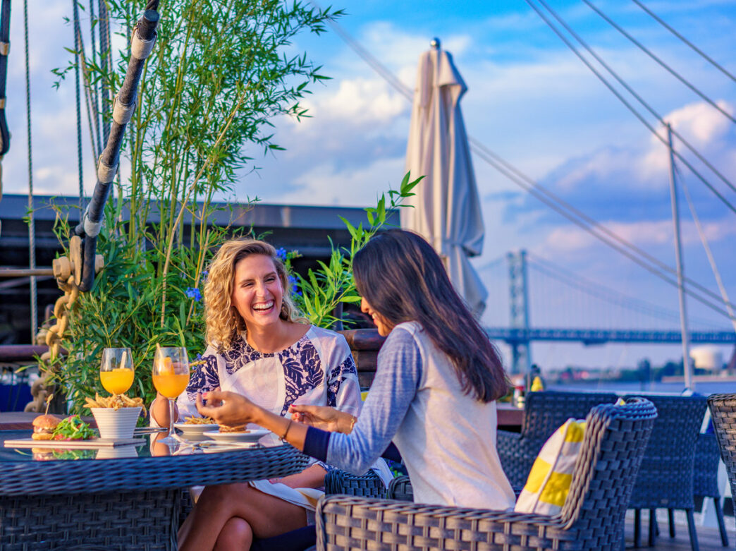 People eating aboard the Moshulu