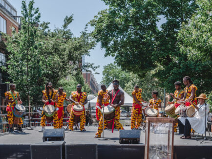 Drummers performing on stage at the ODUNDE Festival in Philadelphia