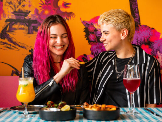 People eating at Laser Wolf