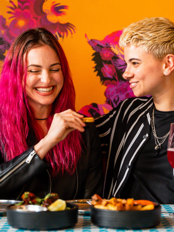 People eating at Laser Wolf