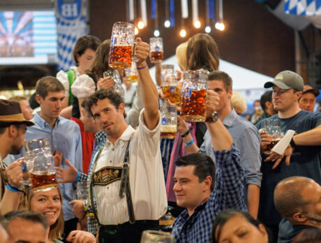People raising glasses of beer