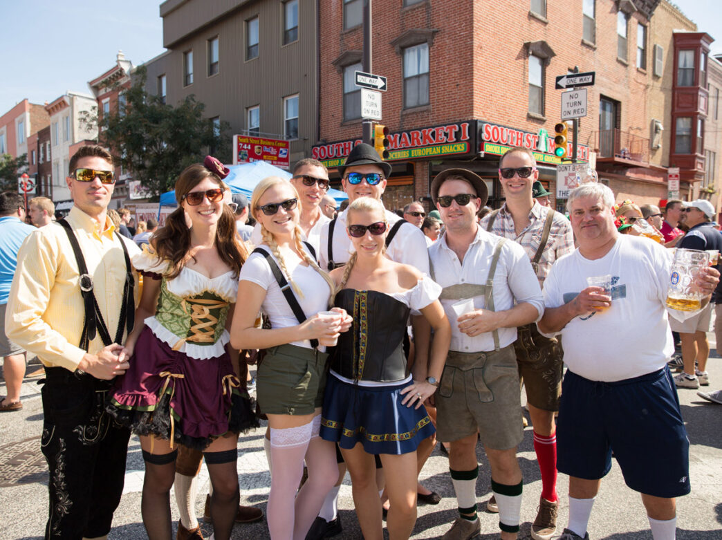 People posing at the South Street Oktoberfest