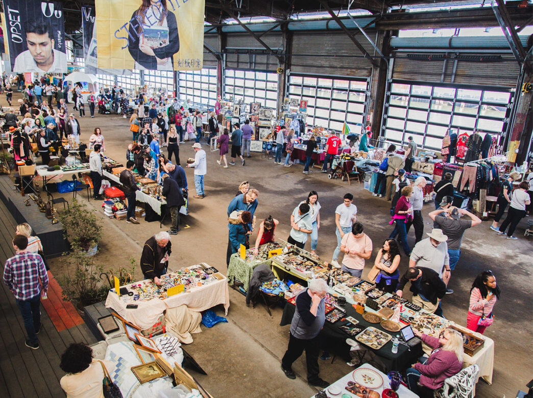 An overhead shot of people shopping at El Mercado Cultural at Cherry Street Pier.
