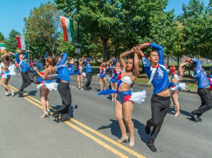 Performers on the street during Puerto Rican Festival Parade